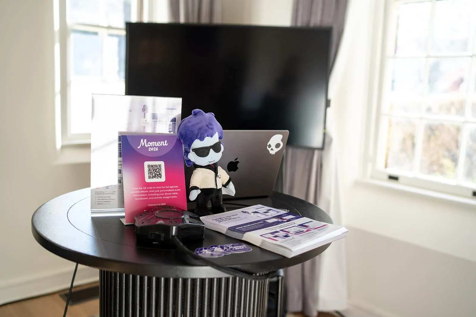 Cori’s Corner, with a Cori plushie and business card