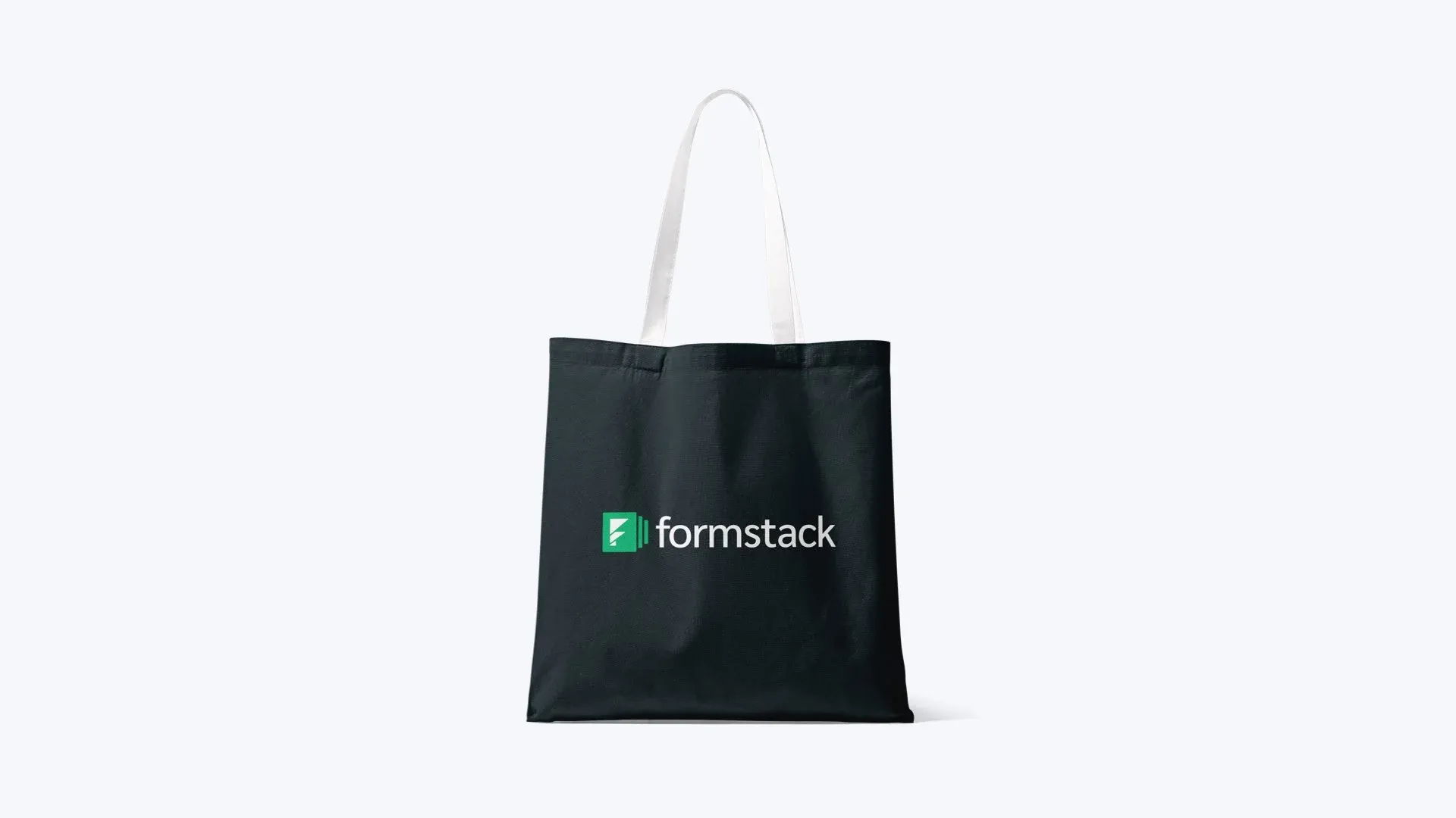 Black tote bag with the Formstack logo